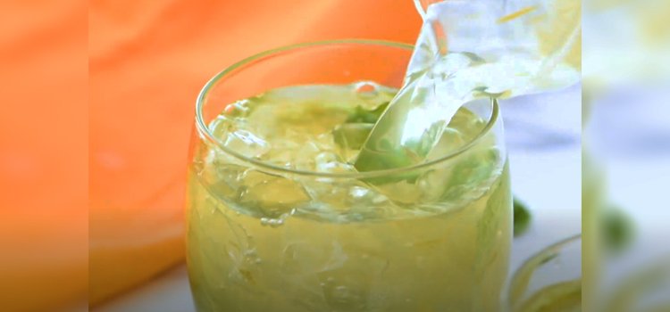 Pouring Limeade on a Glass